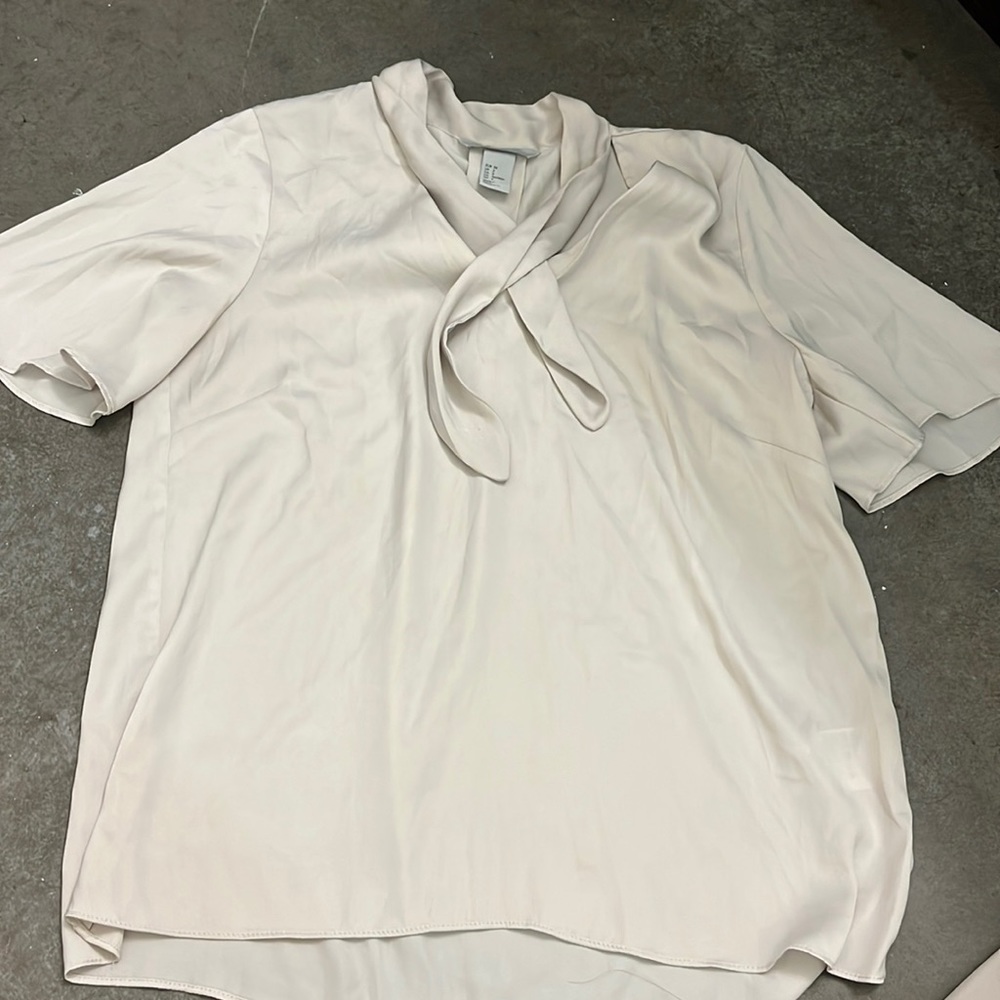 Satin blouse with tie neck detail and ruffle sleeves